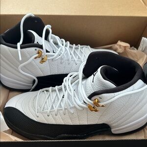 Air Jordan 12 “Retro Taxi” sneakers. New in box. Size 9